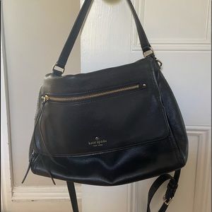 Kate Spade beautiful black leather handbag with gold hardware and striped lining